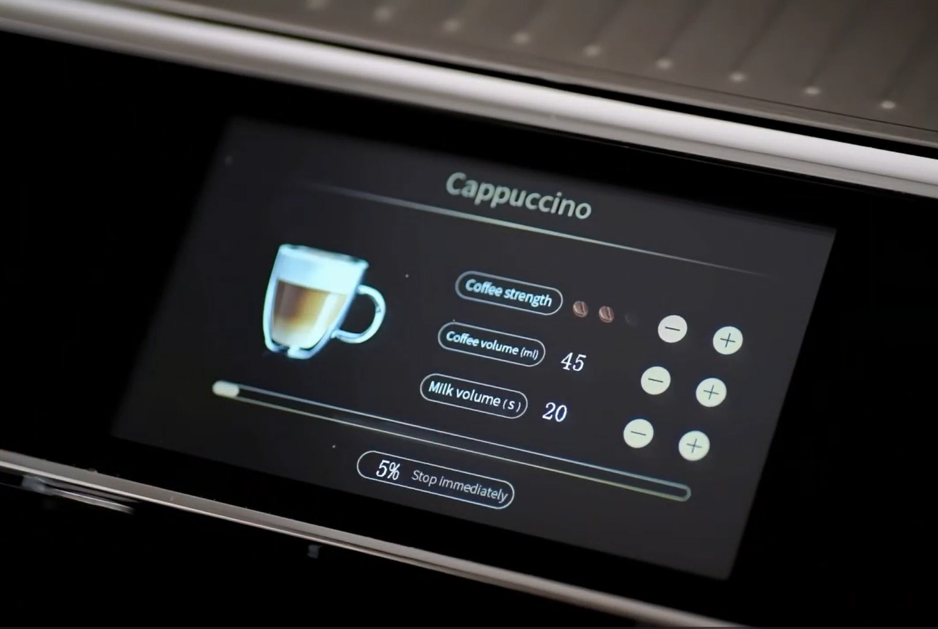Cappuccino strength, coffee volume and milk volume settings on touchscreen.