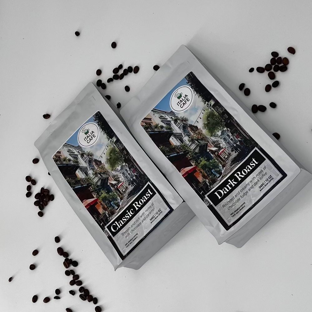 Two bags of coffee labeled 'Classic Roast' and 'Dark Roast' with scattered coffee beans in the background.