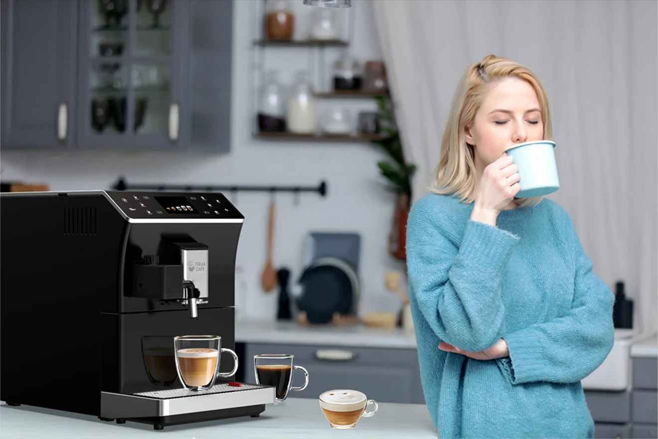Woman in blue sweater making cups of coffee and enjoying a large cup of coffee.
